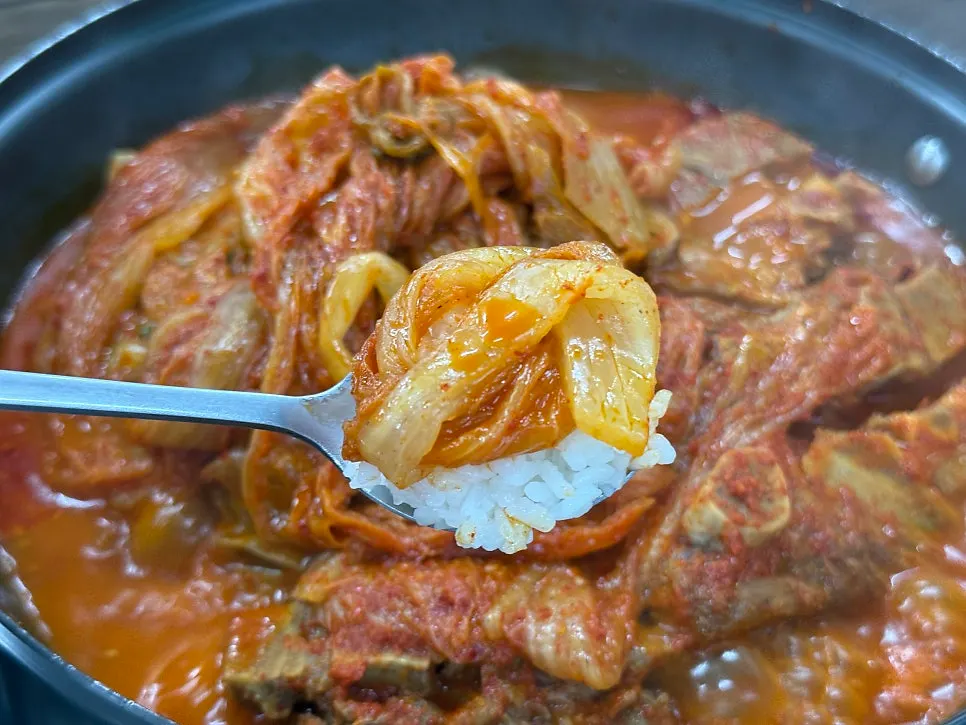 Aged kimchi torn lengthwise to eat