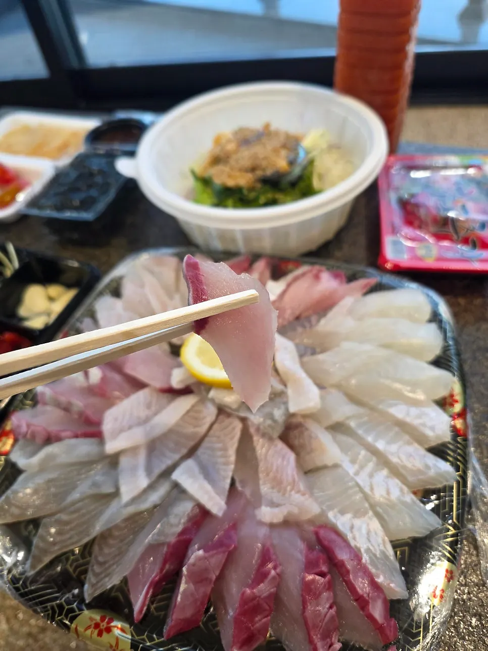 Plate of thickly sliced mixed sashimi