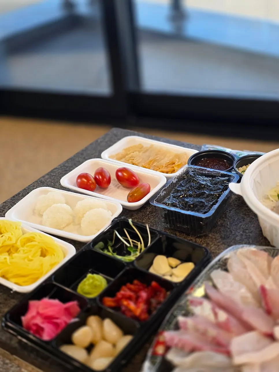 Sashimi and mulhoe spread enjoyed at the hotel