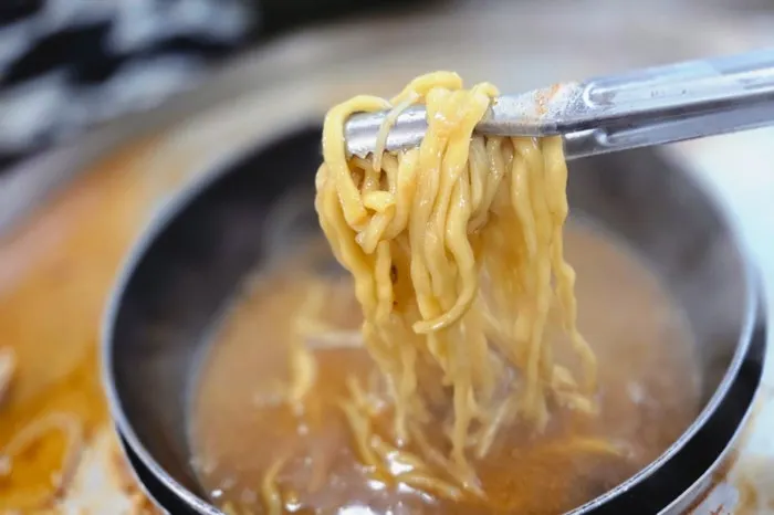 The kalguksu noodles boiled at the end of the meal