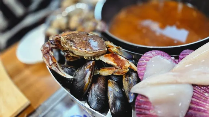 A view of the table at Sokcho Haemul Kkot Jangkalguksu