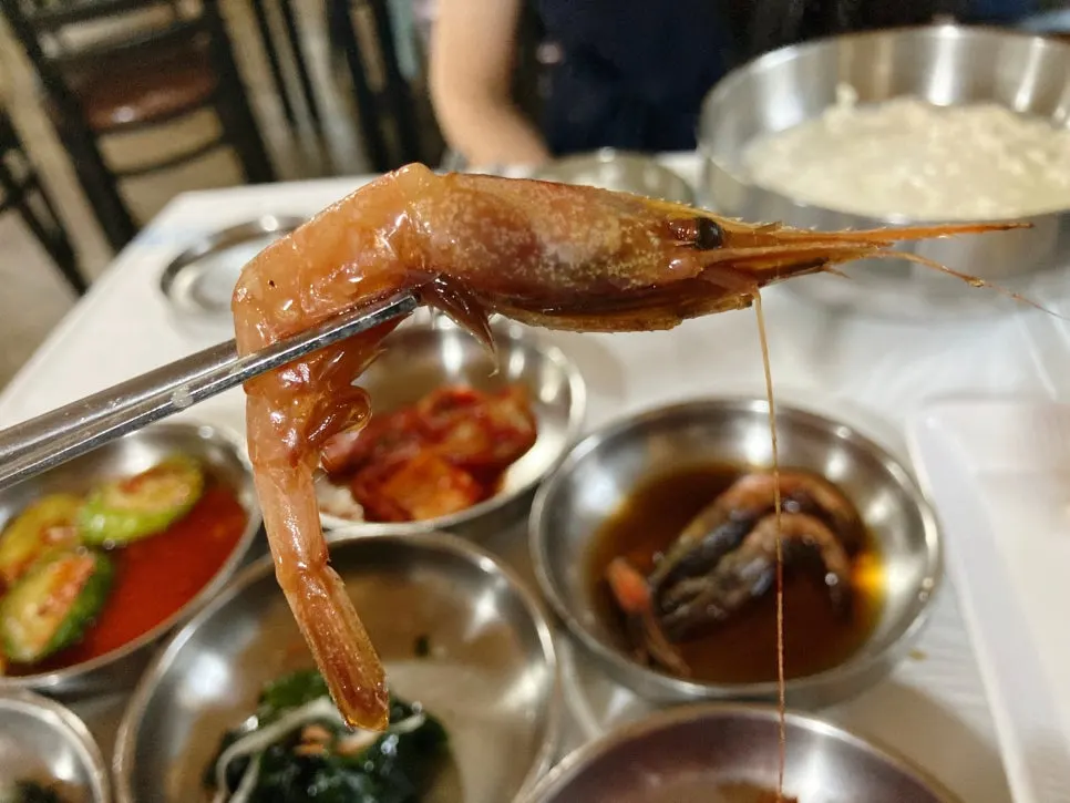 Cucumber salad and other side dishes at Daecheongmaru