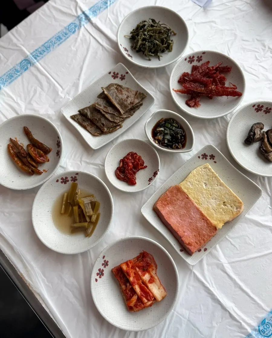 Side dishes including grilled tofu and buckwheat pancakes