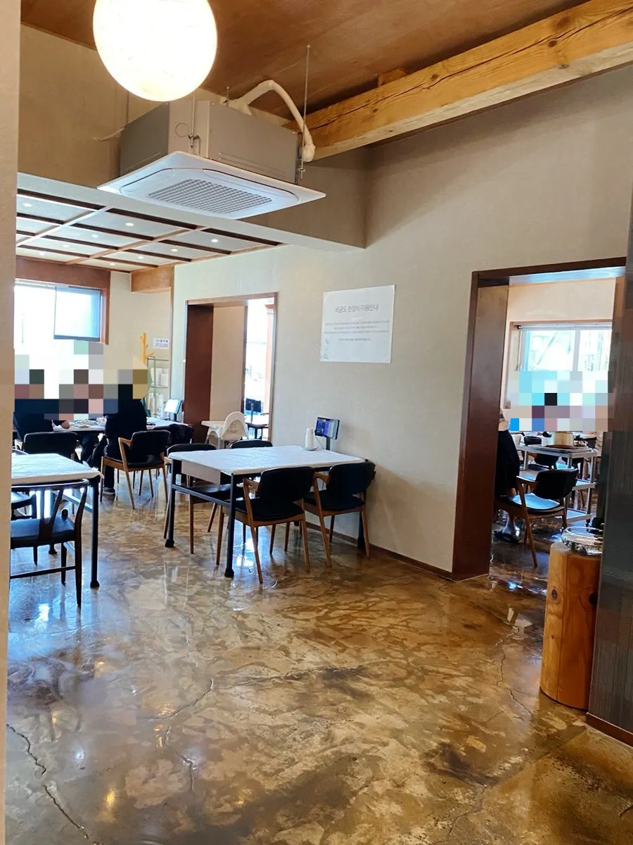 Large windows and wooden ceiling inside Bigeumdo