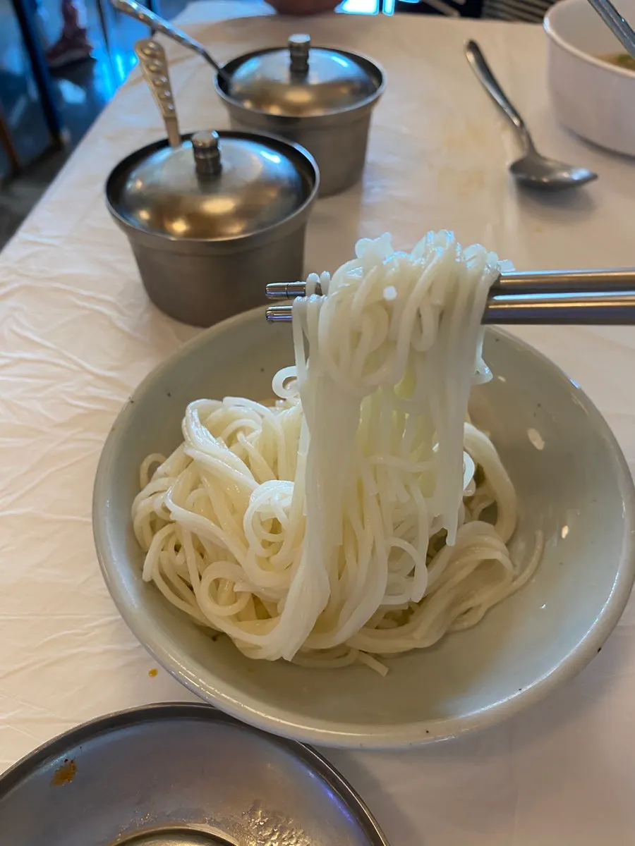 Bowl of mulhoe loaded with raw fish and vegetables