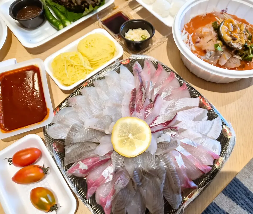 A plate packed full with the mixed sashimi (small) order