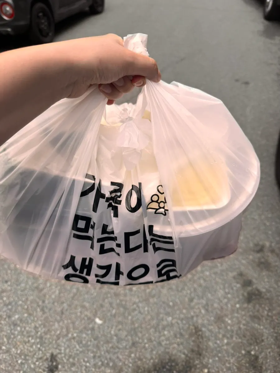 Takeout bags with the small mixed sashimi and mulhoe