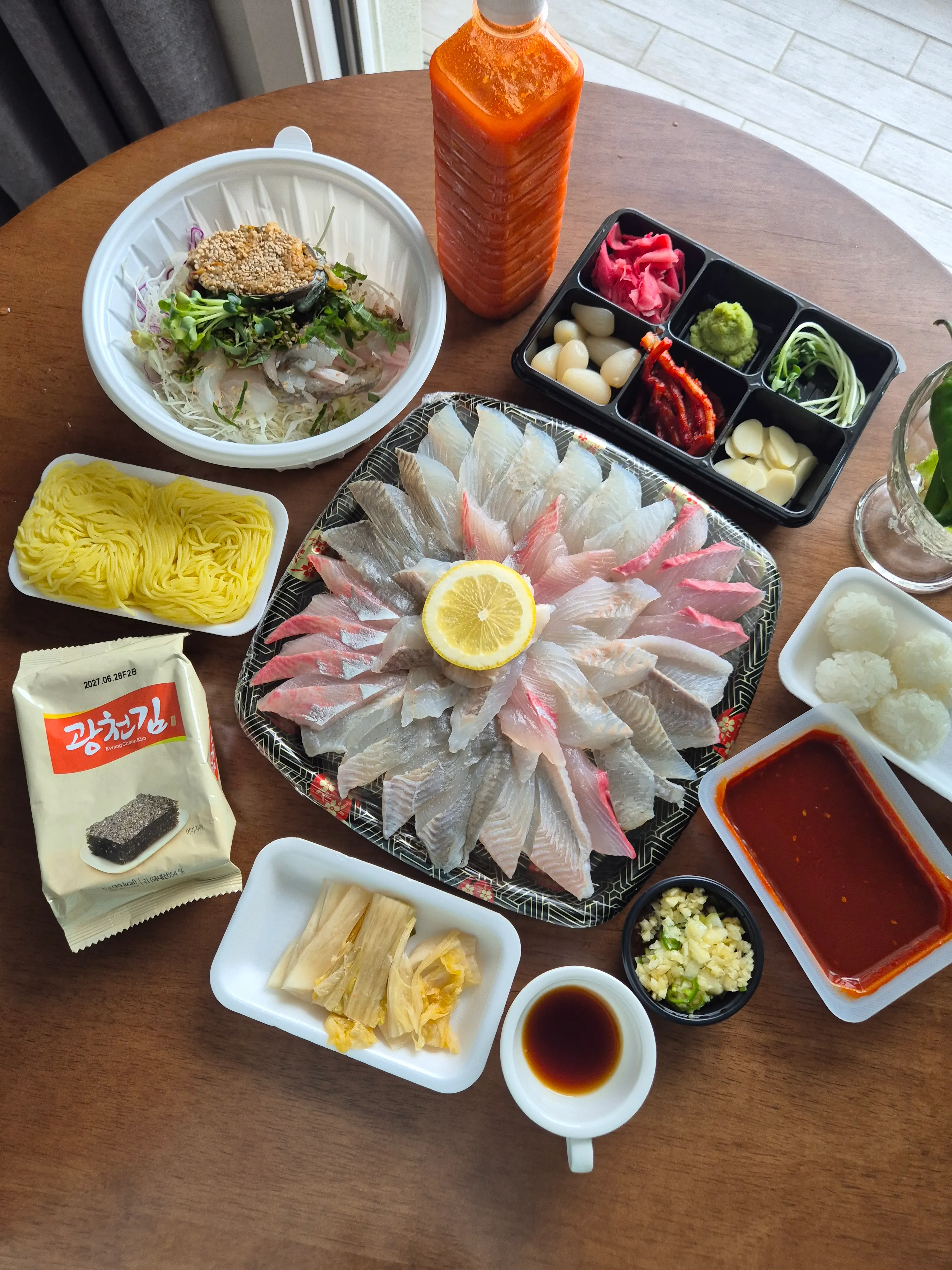A thickly sliced piece of sashimi from Hoega's mixed sashimi platter