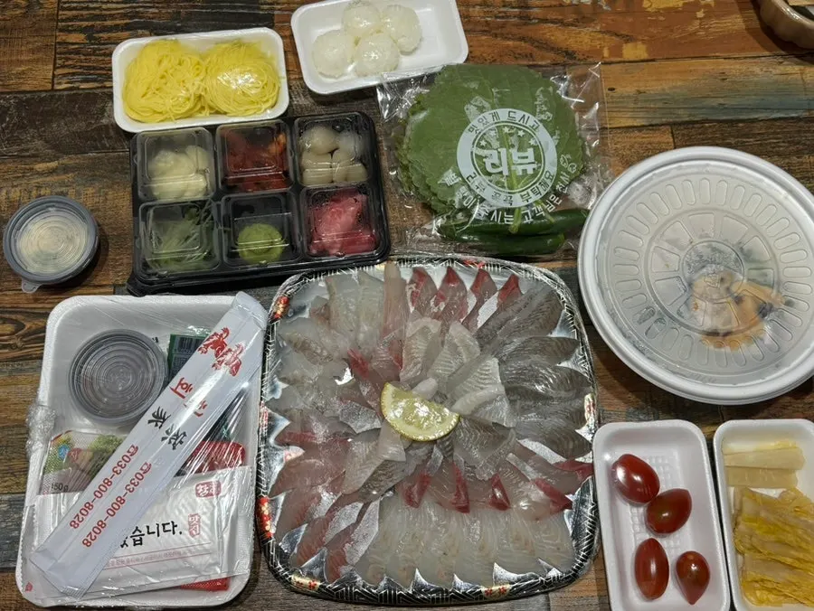 Mixed sashimi (small) and yukhoe spread from a previous visit