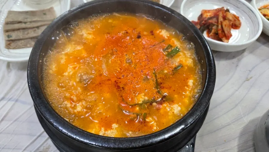 Seafood jjamppong sundubu served in a stone pot