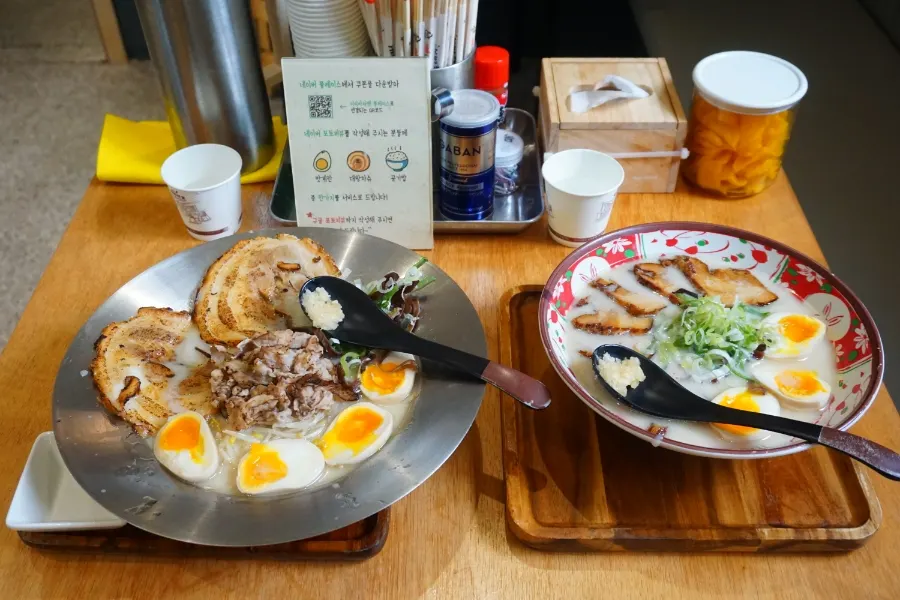 Two bowls of ramen picked up semi-self-service style