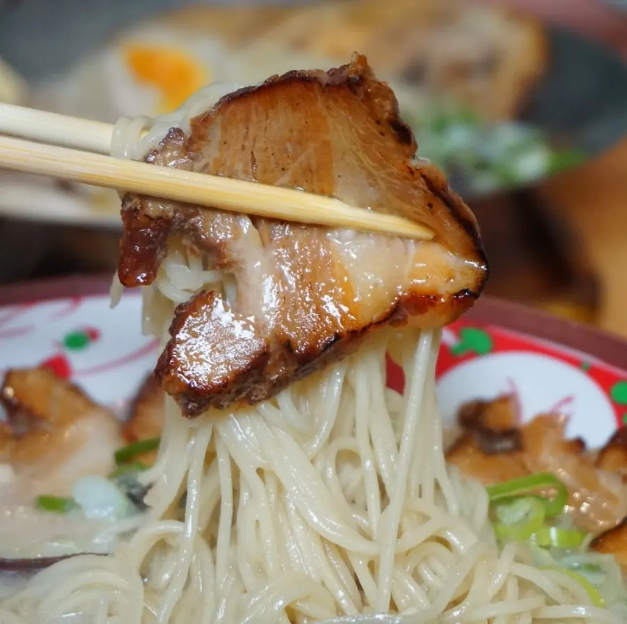 Tonkotsu Ramen topped with thinly sliced char siu