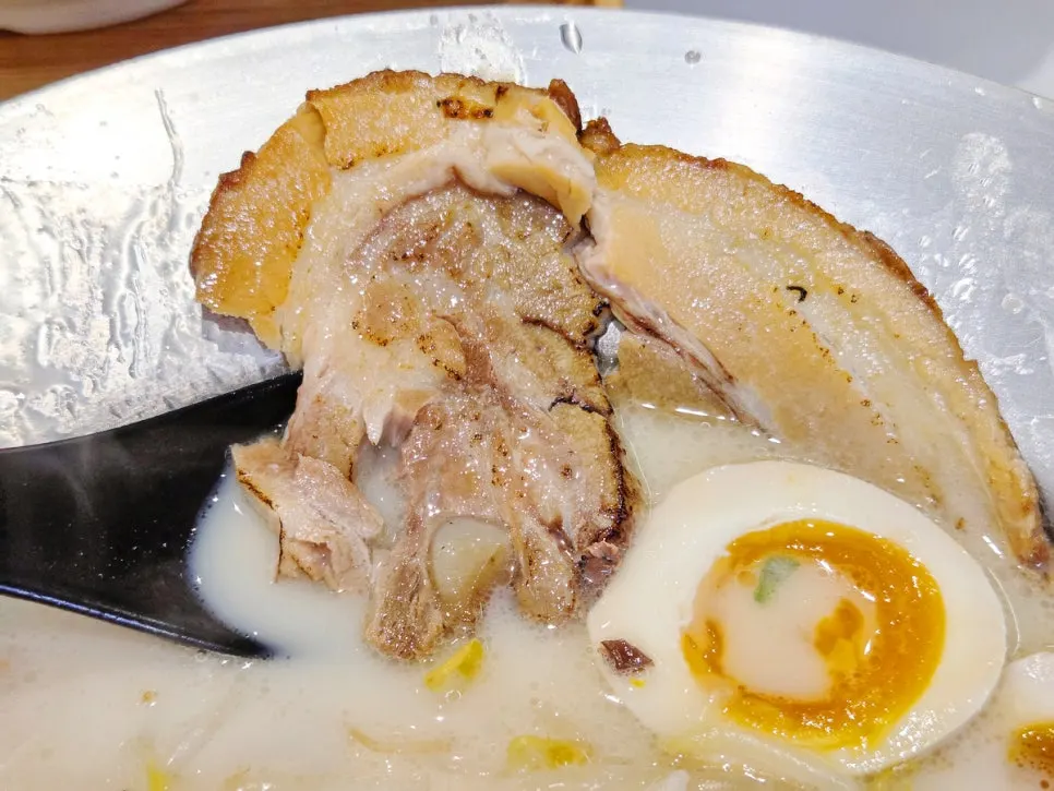 Noodles and broth of the tonkotsu ramen