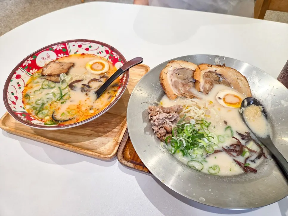 Table set with two shared bowls of ramen
