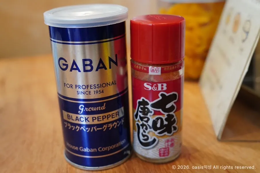 Seasonings and hair ties placed on the table