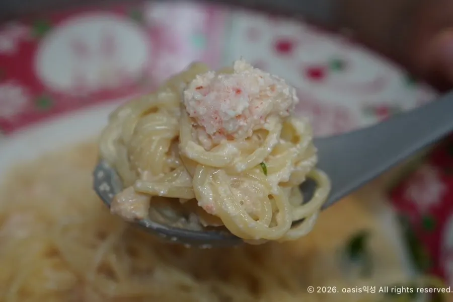 A bowl of red snow crab and pollack roe cream ramen