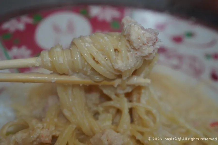 Close-up of the cream sauce and crab meat topping