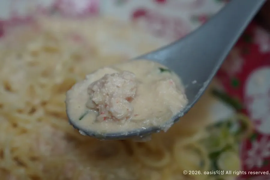 Noodles coated in cream sauce