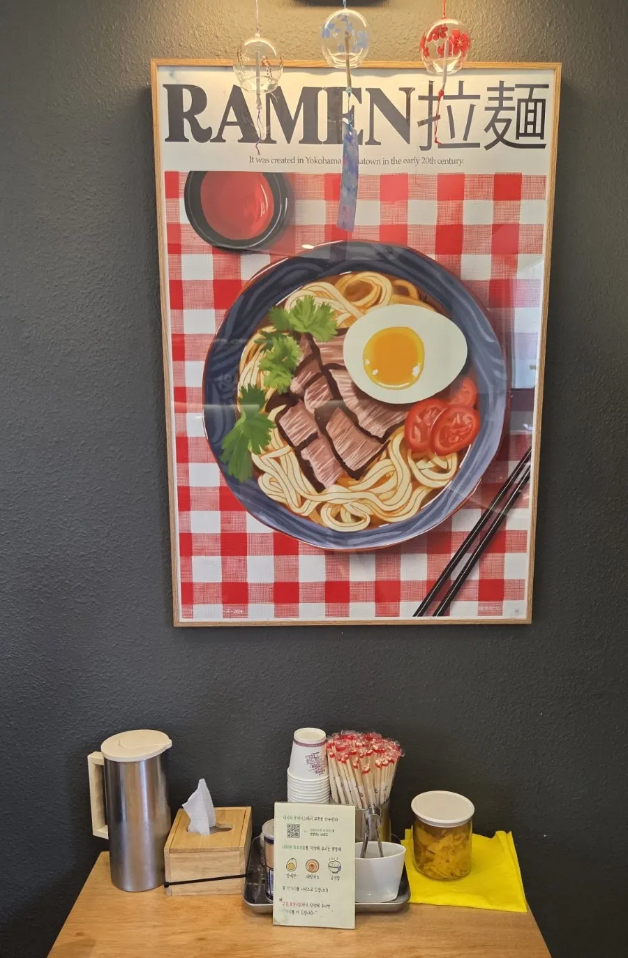 Framed ramen illustration on the wall