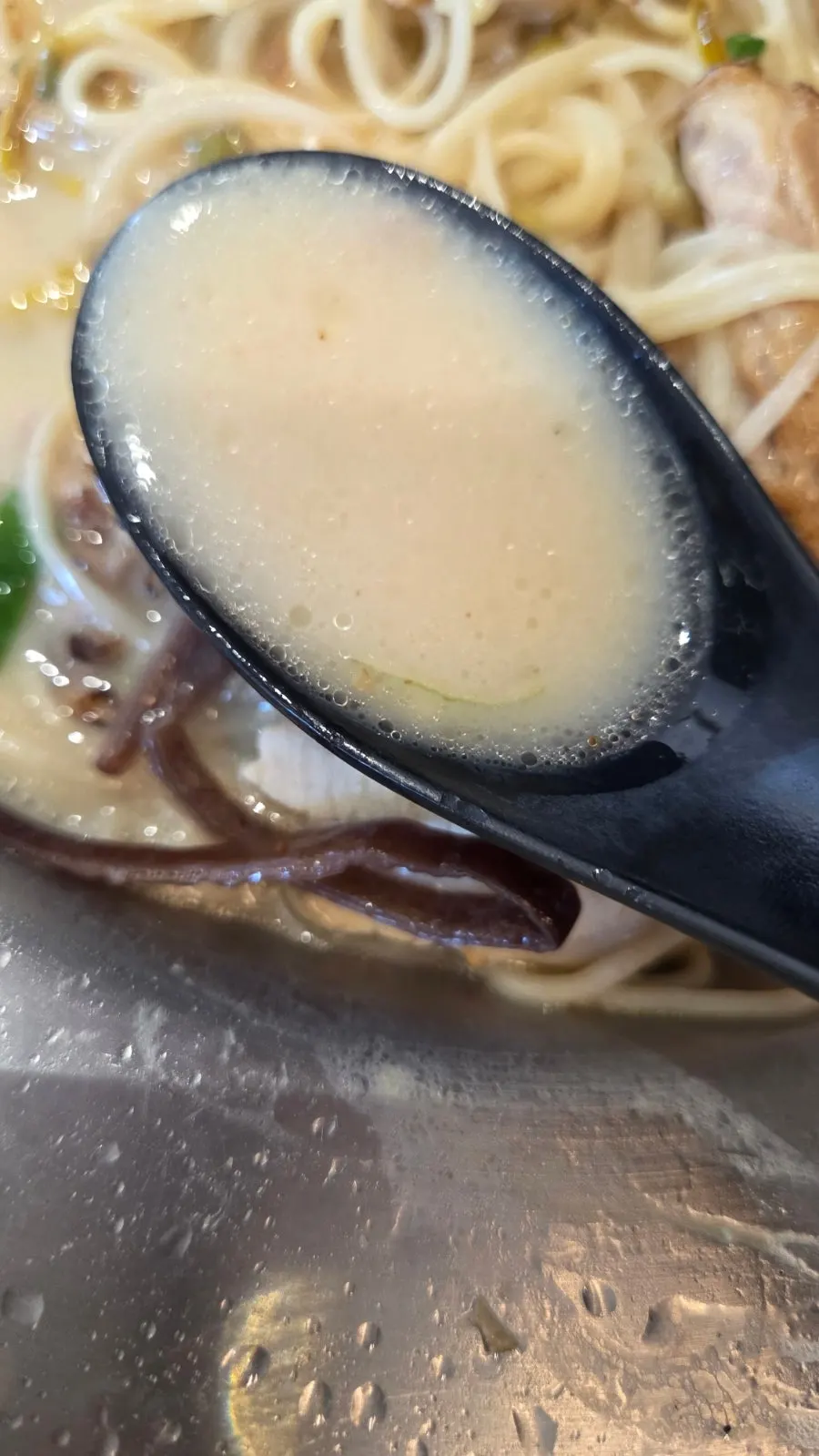 Two bowls of ramen on the table