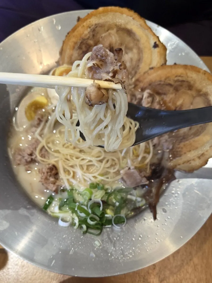 Tonkotsu ramen topped with soft-boiled ajitama egg