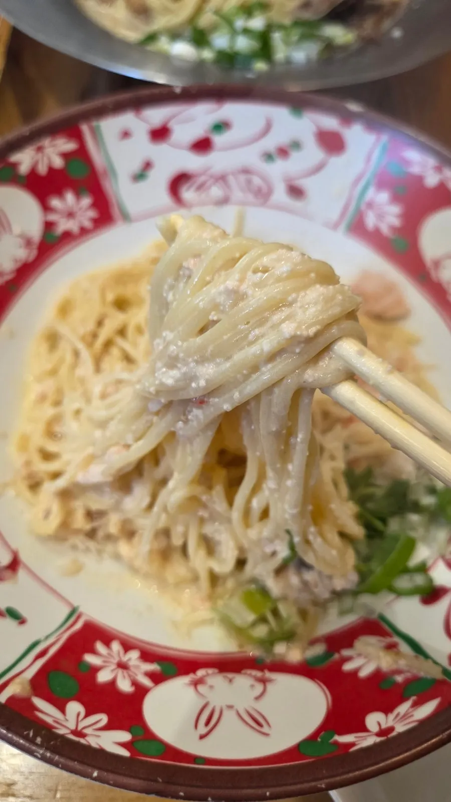 Ramen topped with crab meat in cream sauce