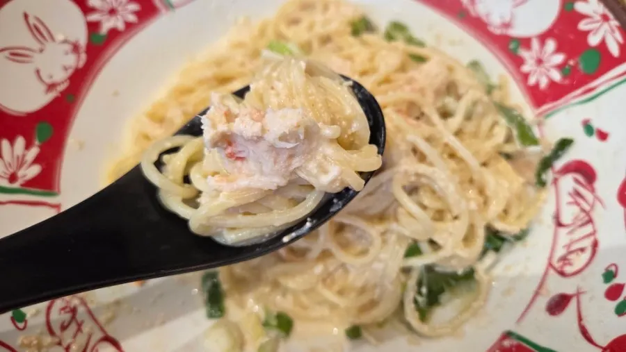 Close-up of noodles coated in cream sauce