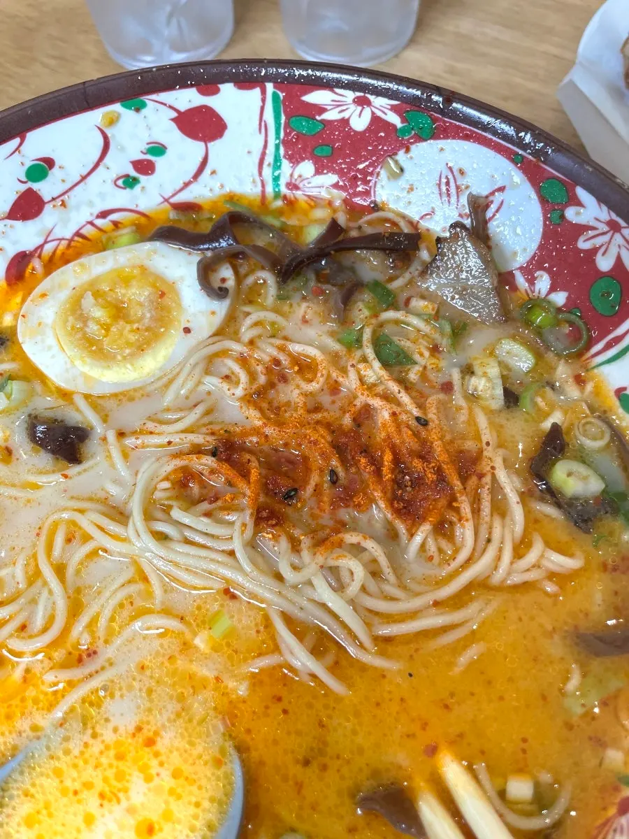 Fiery broth and toppings in karai ramen