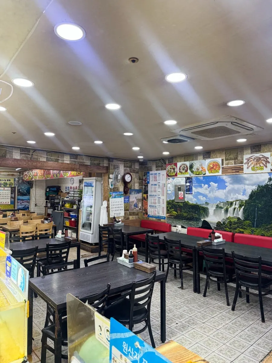 Spacious tables in the main hall of Jinmi Hwareo Center