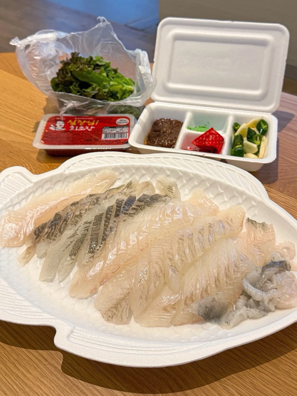 Flounder and dab sashimi platter set up on the table at the accommodation