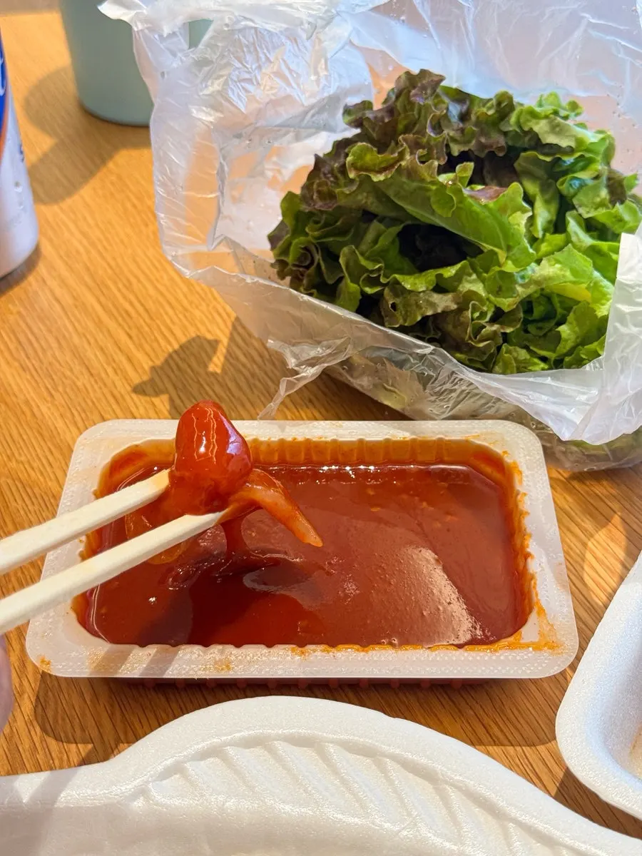 Vinegar-chili sauce, soy sauce, and wasabi provided with the order