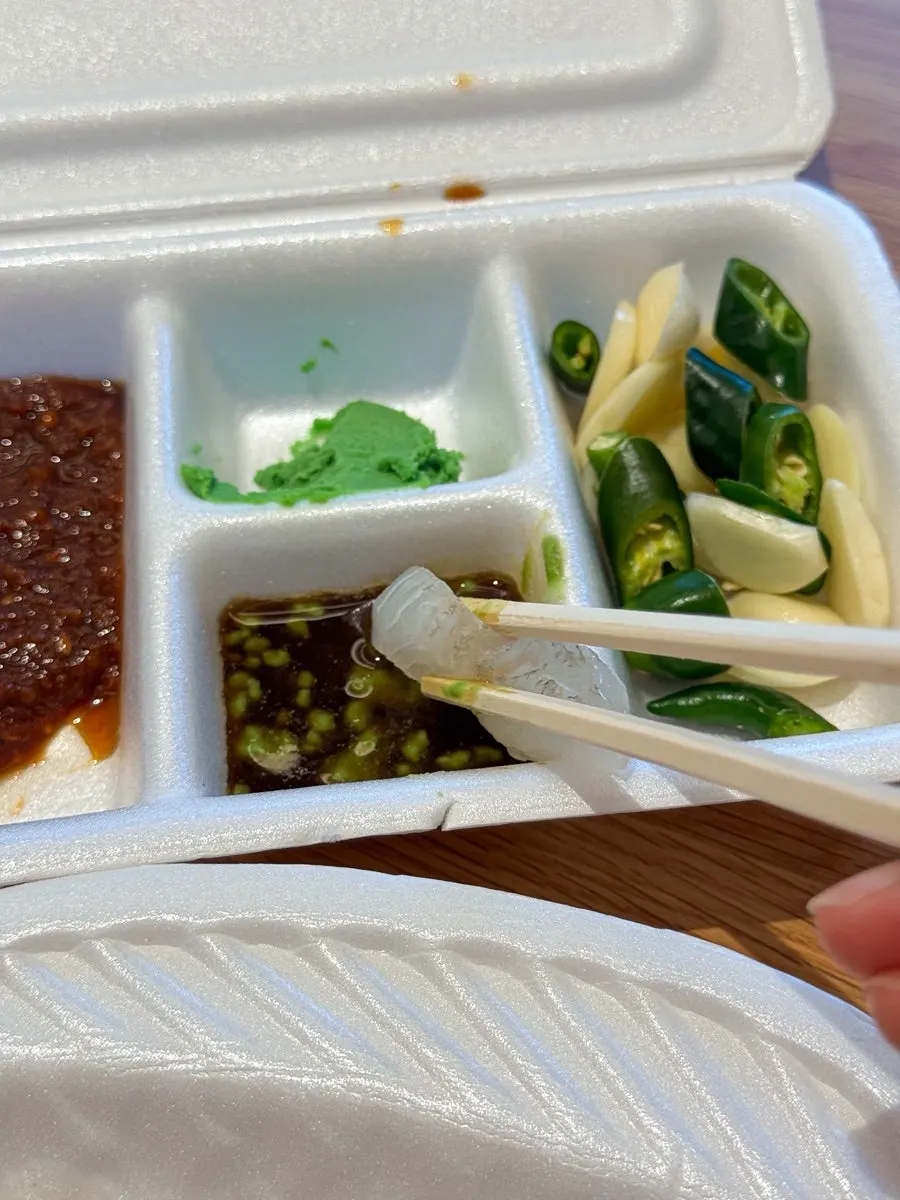 Lettuce, garlic, and cheongyang peppers for wrapping the sashimi