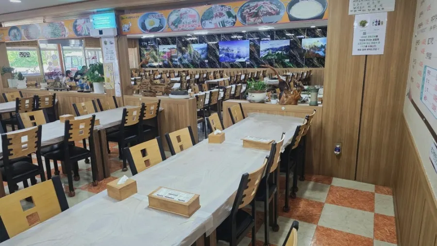 Wide dining hall and seating layout at Jinsol Halmeoni Sundubu