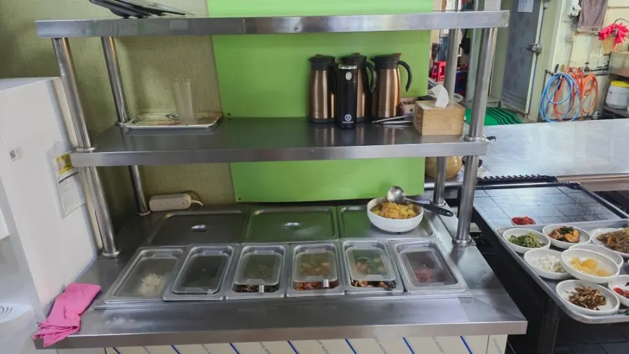 Emptied side dish plates and rice bowl