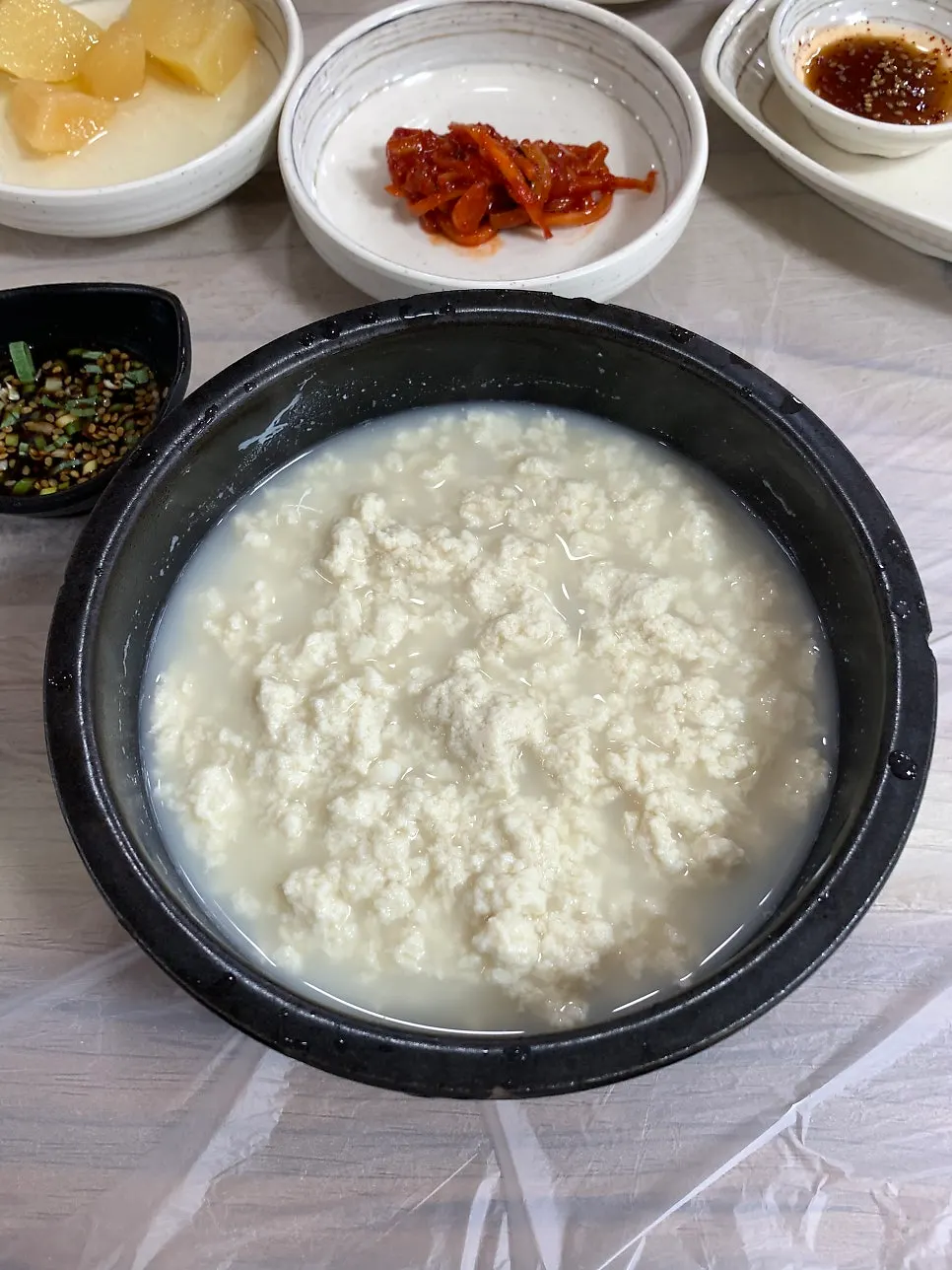 Chodang sundubu served in a hot stone bowl