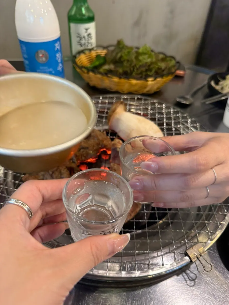Toasting with the complimentary side dishes