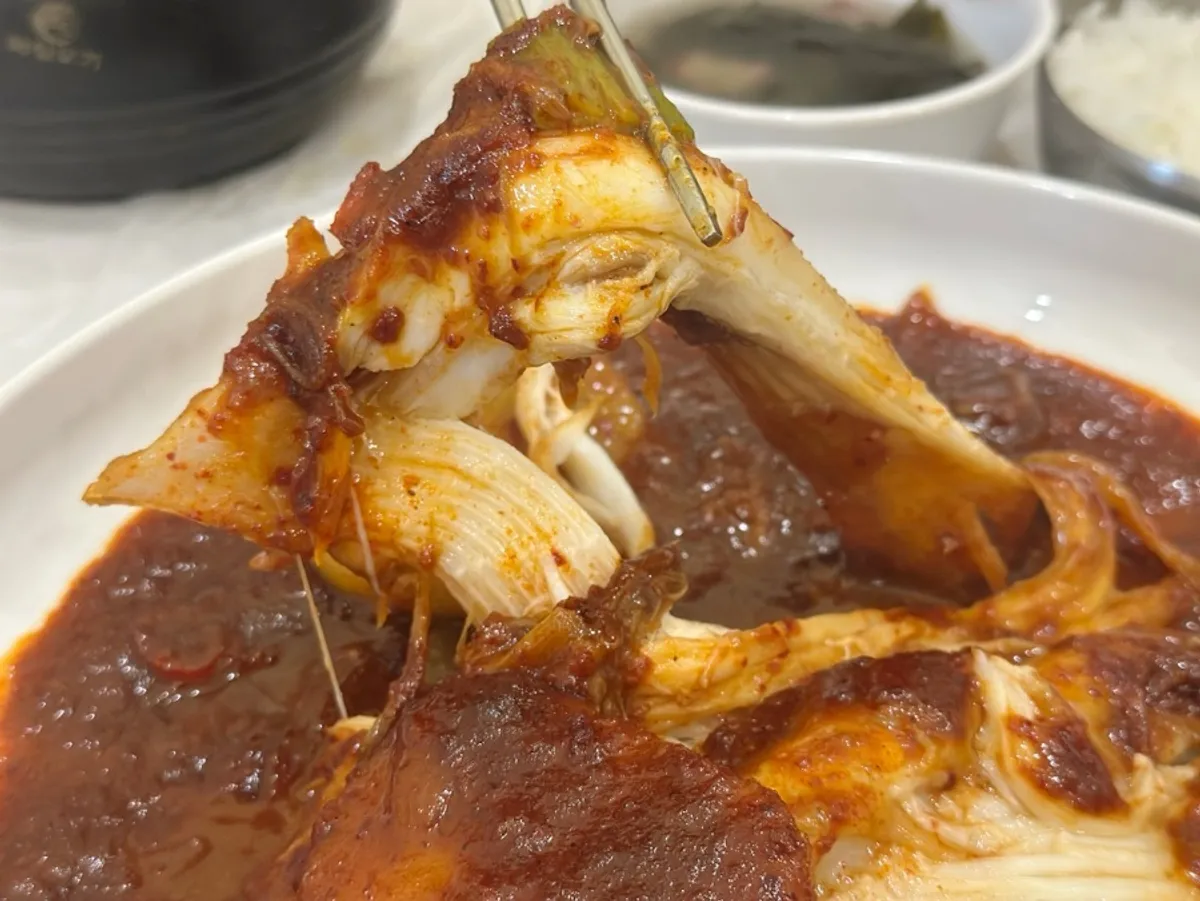 White flesh visible in the steamed skate