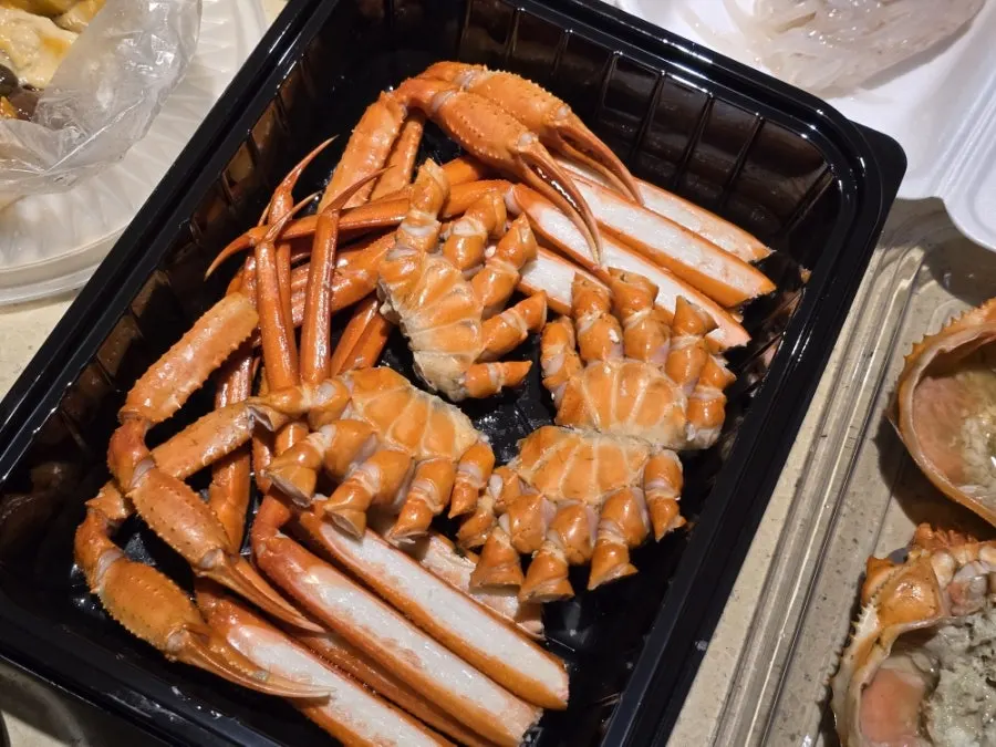 Fully meat-packed red snow crab legs and shell innards