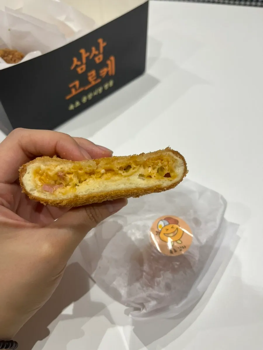 Sharing a croquette split in half