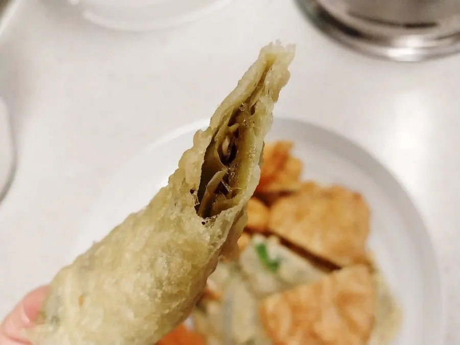 Reheated red snow crab tempura on a plate