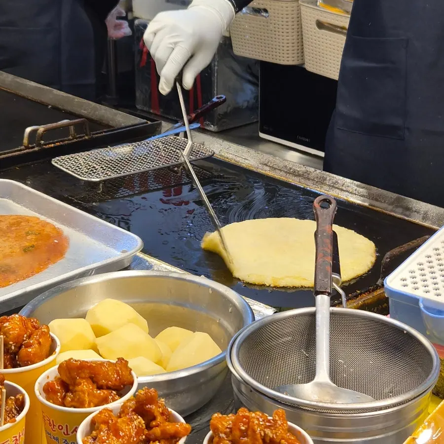 Potato pancakes being griddled fresh on the spot