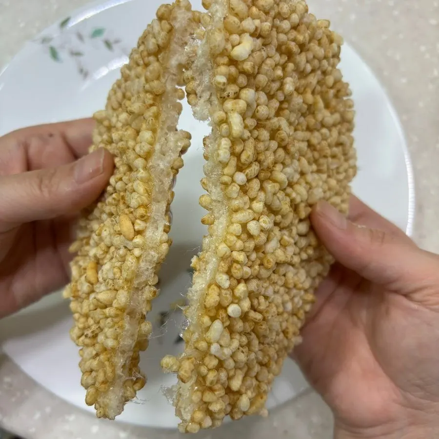 A piece of white rice grain gangjeong