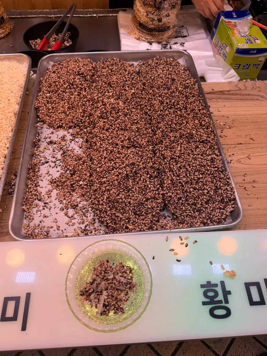 Display shelf showing the price list for grain gangjeong sets