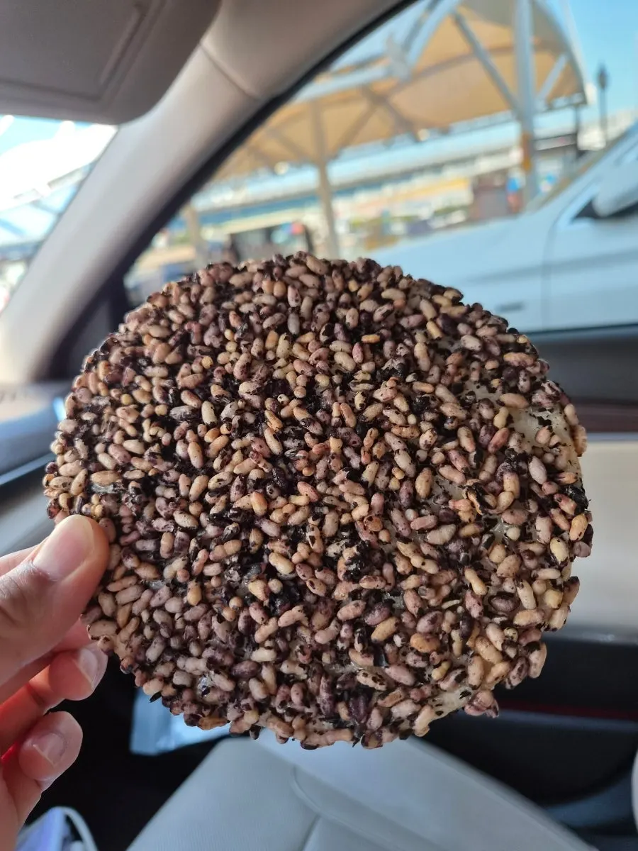A crunchy piece of brown rice grain gangjeong