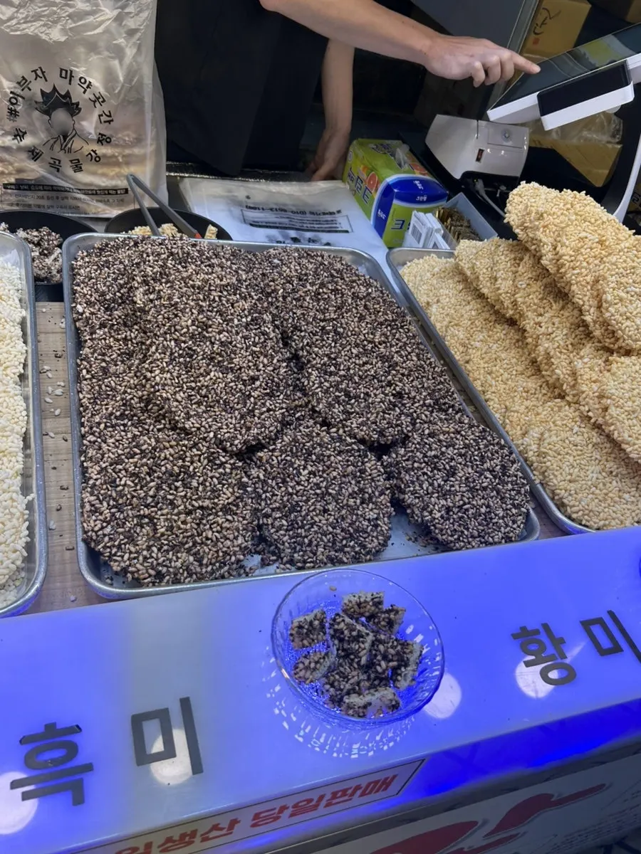A piece of grain gangjeong held in hand
