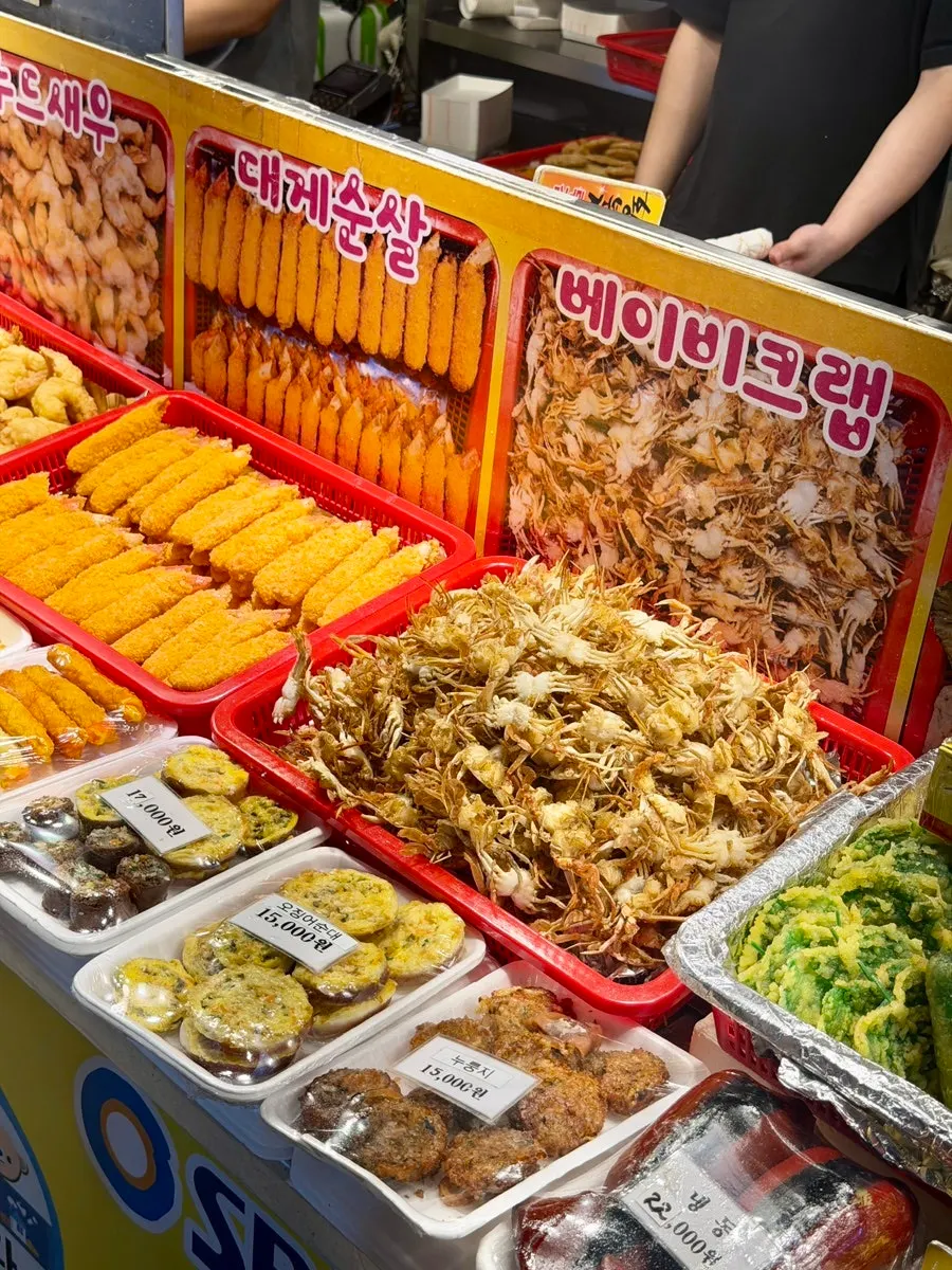 Squid tempura and king prawn on display at Hwangbuja Twigim