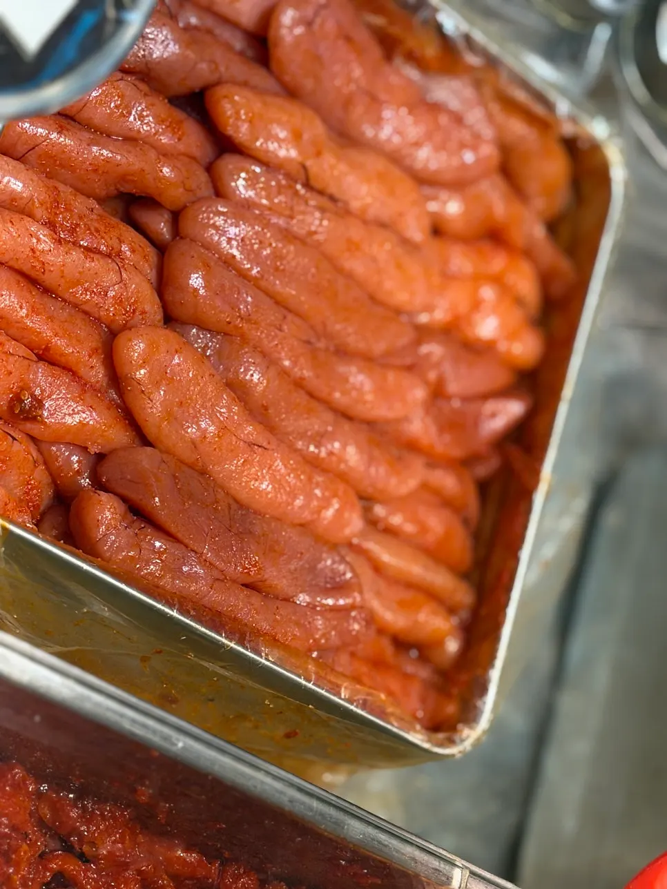 Sampling pollock roe and squid jeotgal