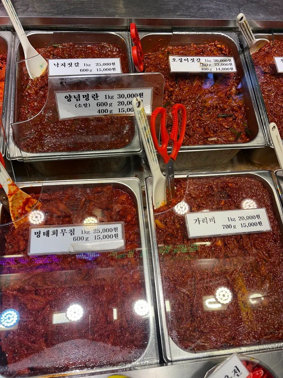 Display of galchi sokjeot, clam jeotgal, and myeongnanjeot