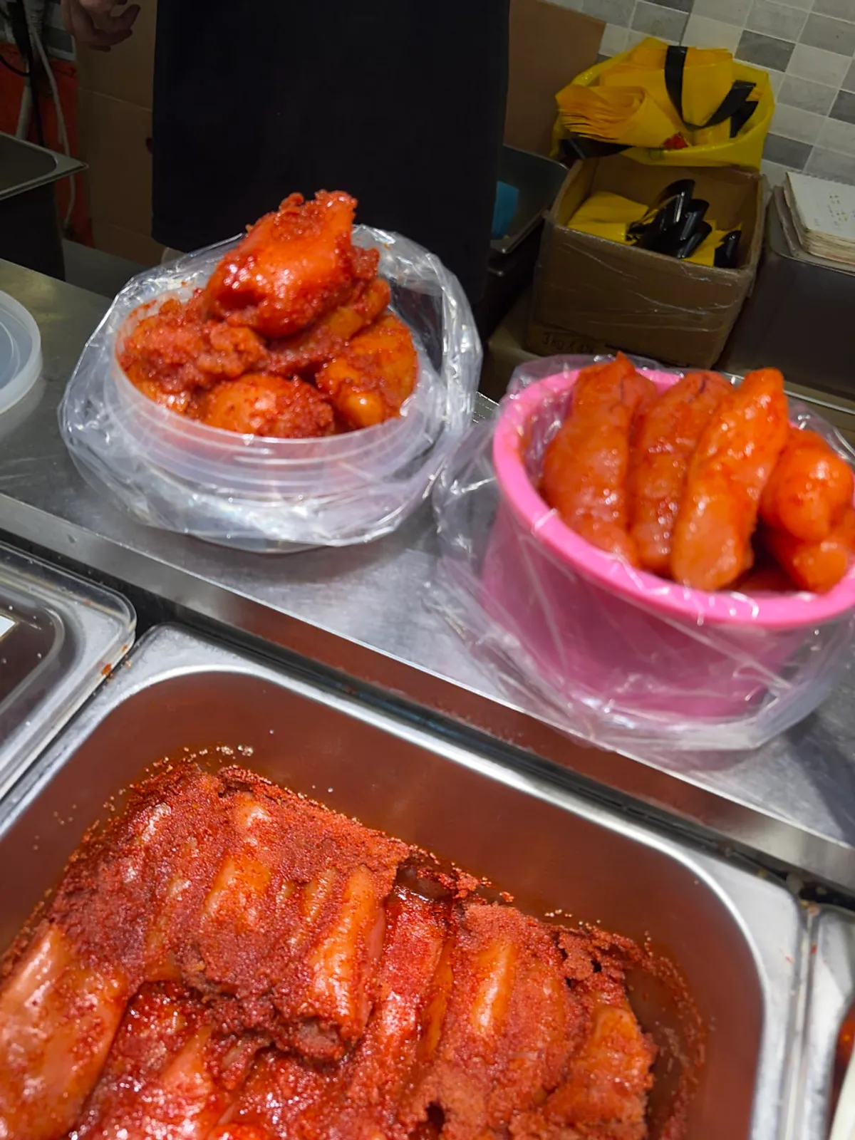 Generously packed salted seafood in containers