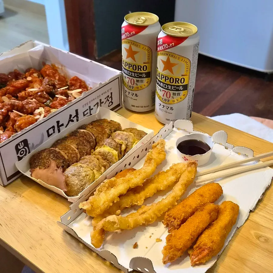 Container of assorted fried foods packed to go